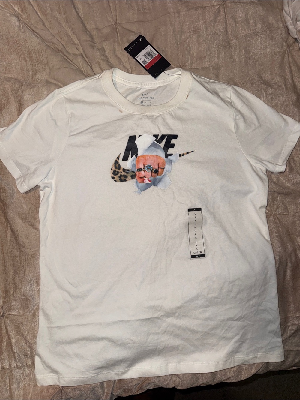 Nike White Short-Sleeve Graphic Tee with Leopard Swoosh